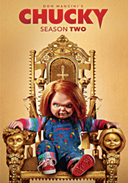 chucky doll sitting in throne