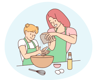 A blonde girl has her hands out over a mixing bowl while her mother, a redhaired woman, pours flour. They are both smiling, other cooking instruments are spread out on the table in front of them.
